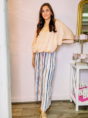 Striped palazzo pants with cinched waist.