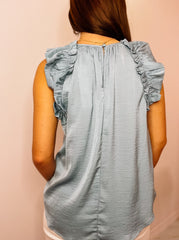 Sleeveless Ruffle Trim Blouse