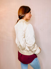 Cream bomber jacket