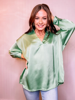 Mint v neck lapel collared blouse, cuffed sleeves with button closure.